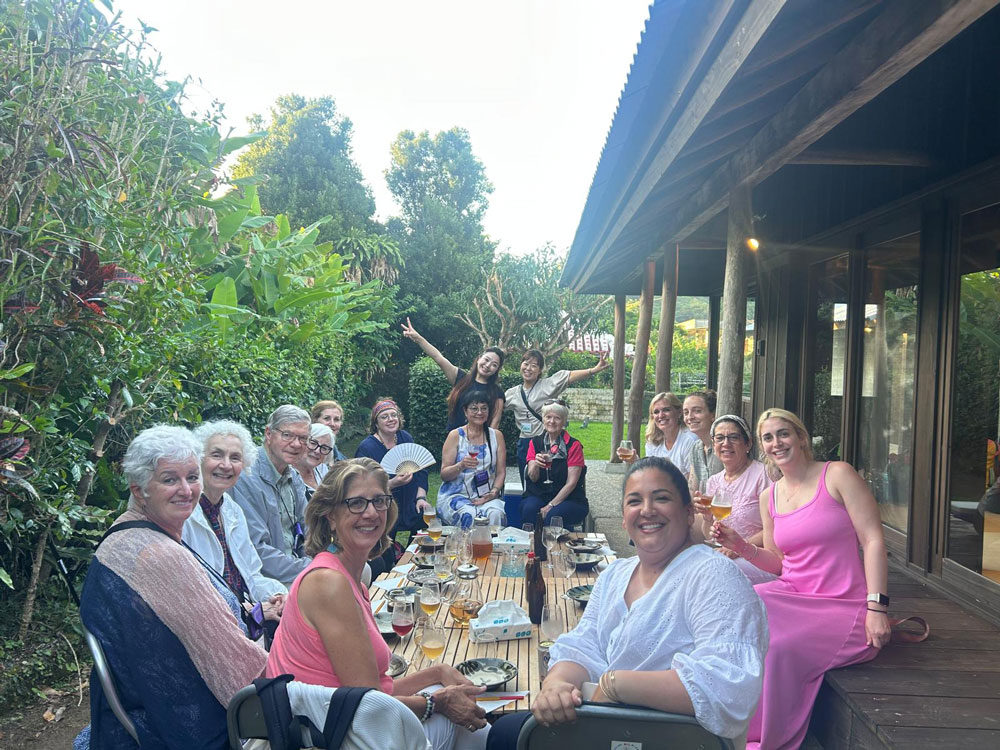 Ogimi Village welcomes professional caregivers with a traditional barbeque dinner
